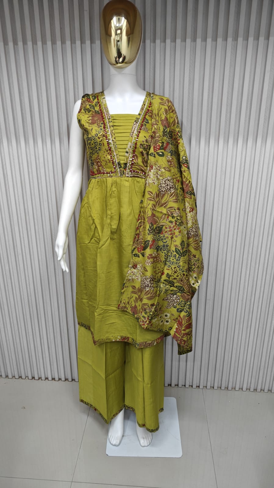 classic straight-cut kurti, with an intricately embroidered yoke