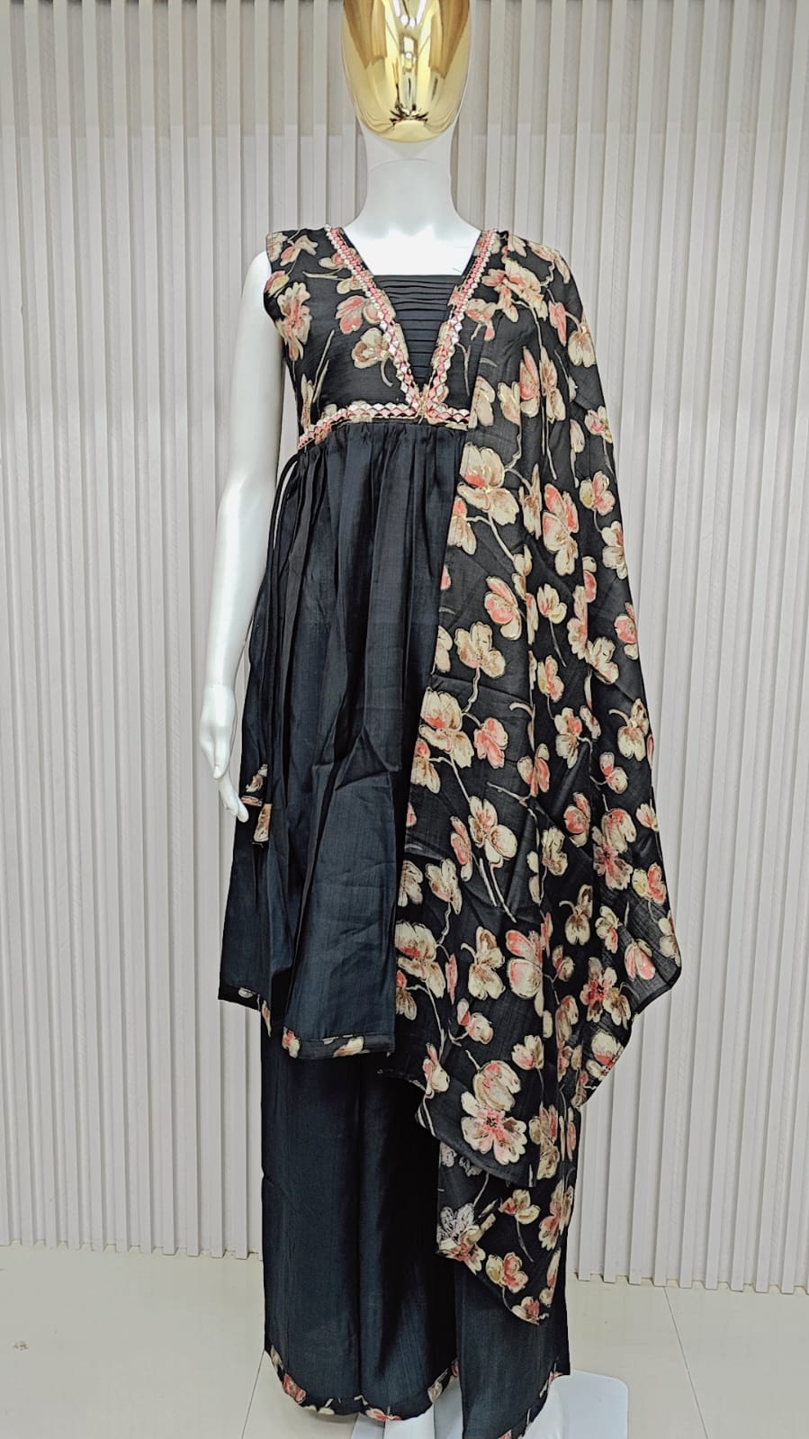 classic straight-cut kurti, with an intricately embroidered yoke