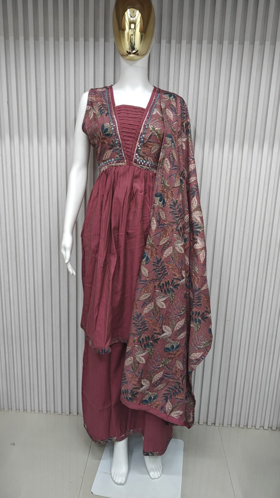 classic straight-cut kurti, with an intricately embroidered yoke
