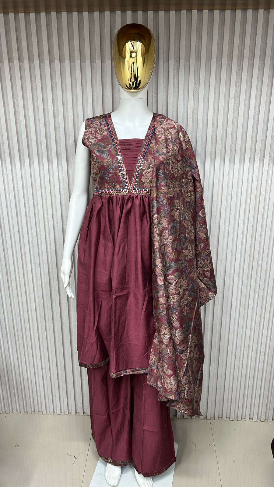classic straight-cut kurti, with an intricately embroidered yoke