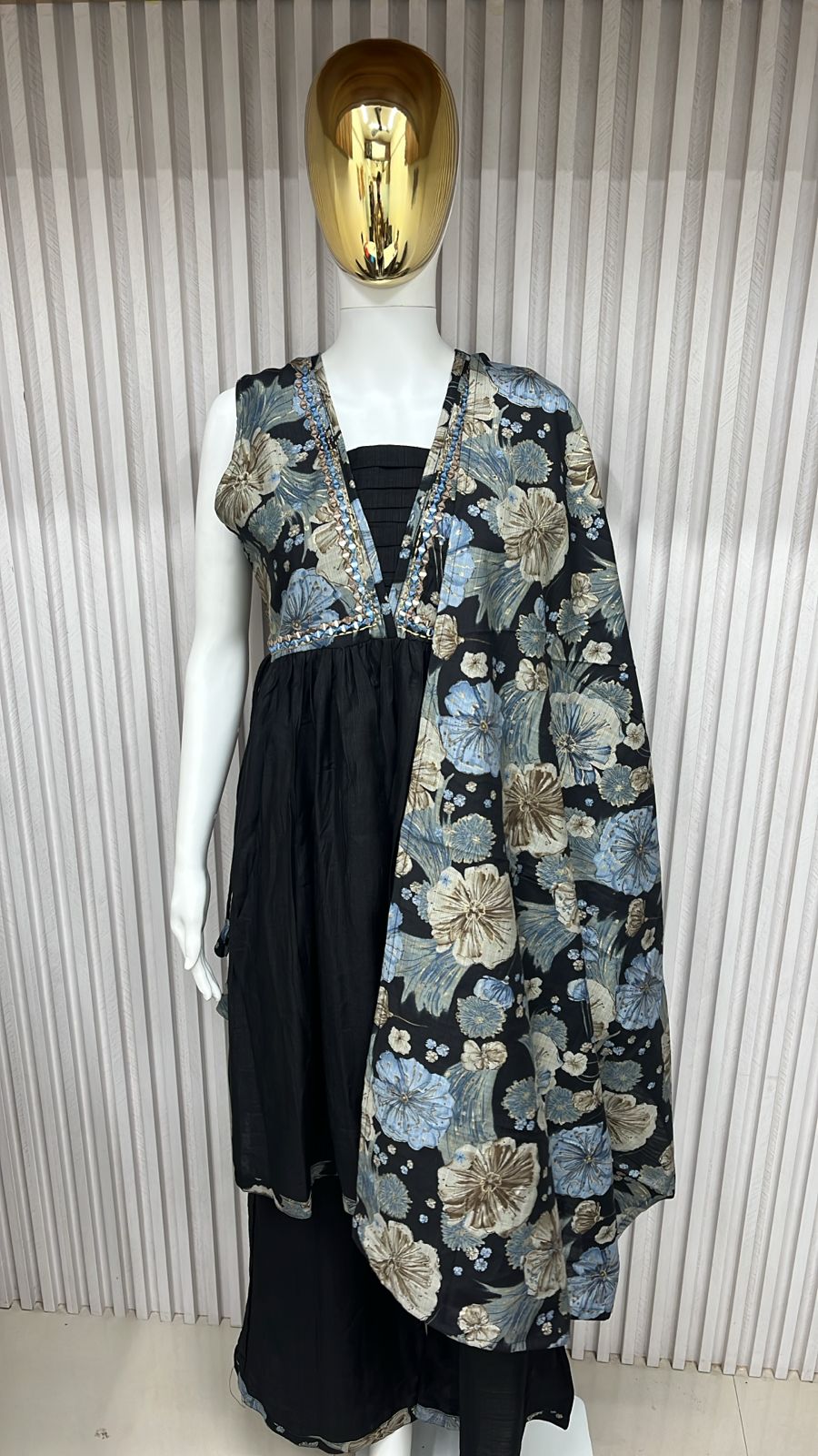 classic straight-cut kurti, with an intricately embroidered yoke