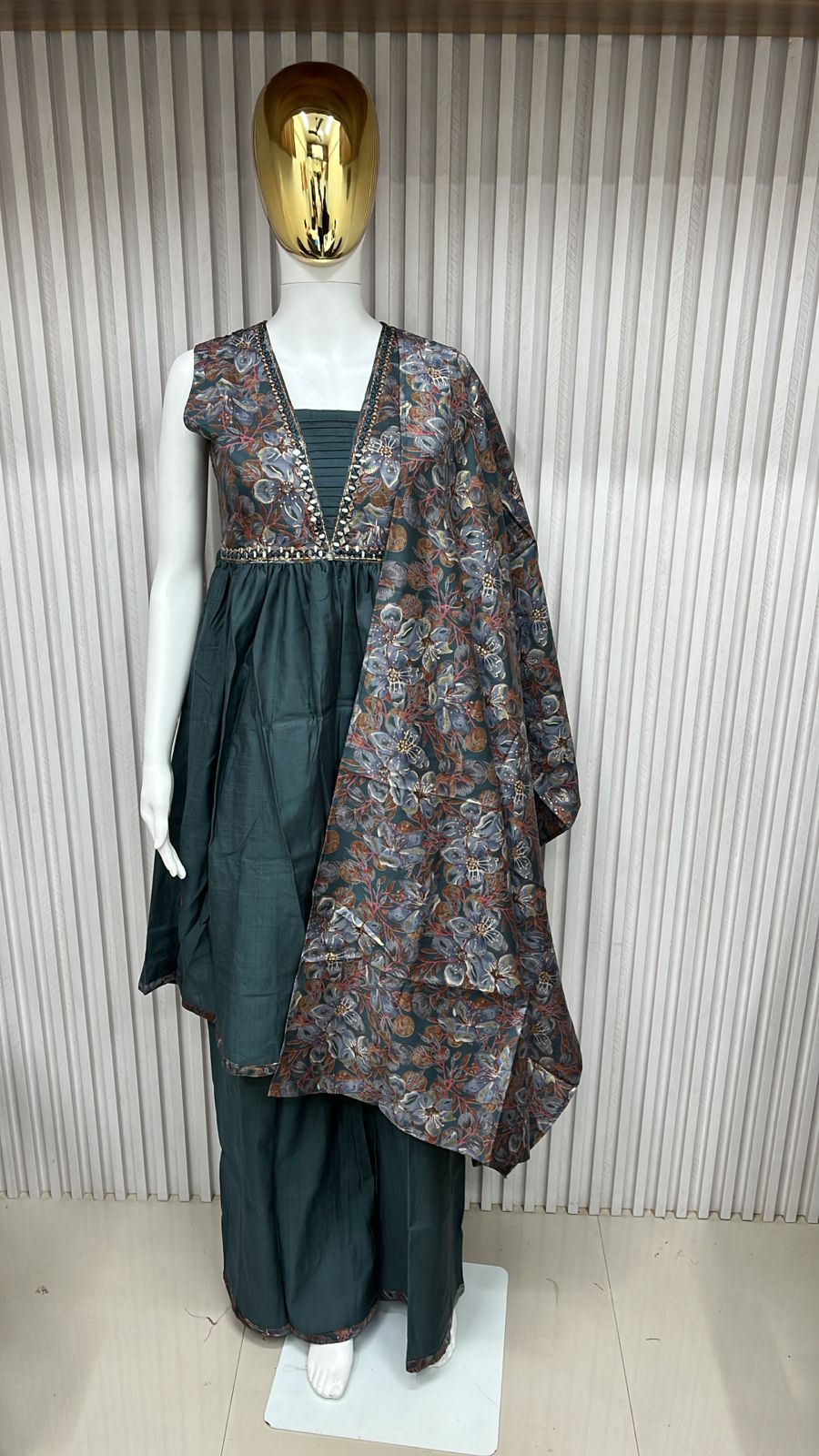 classic straight-cut kurti, with an intricately embroidered yoke