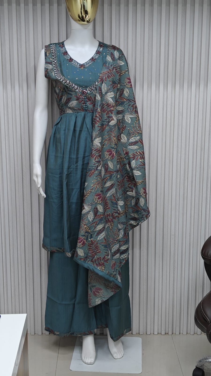 classic straight-cut kurti, with an intricately embroidered yoke