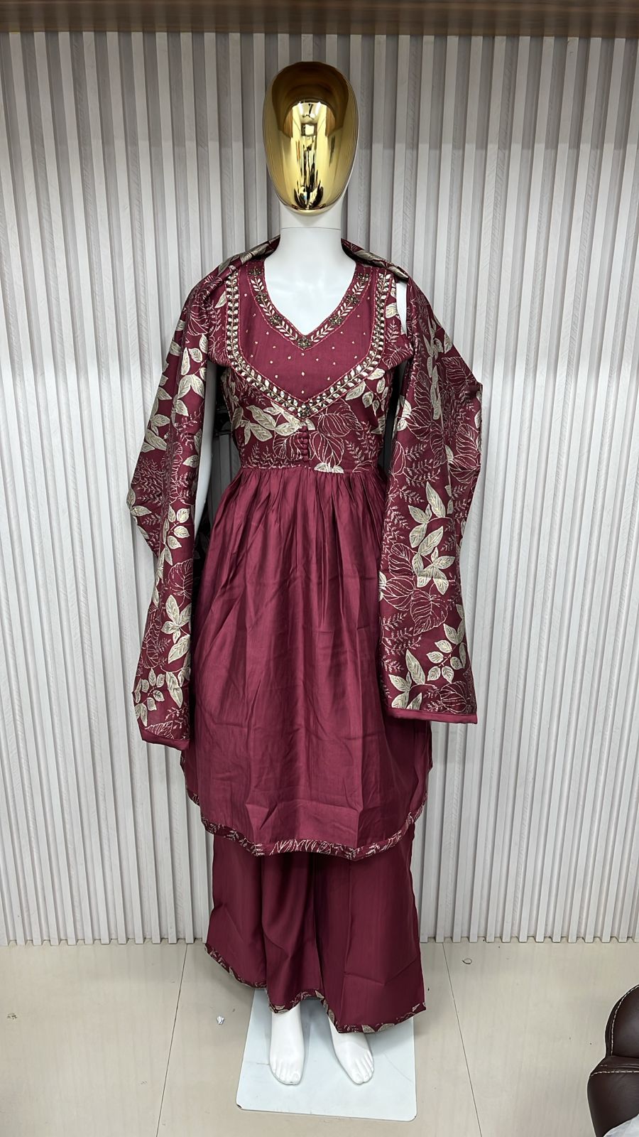 classic straight-cut kurti, with an intricately embroidered yoke