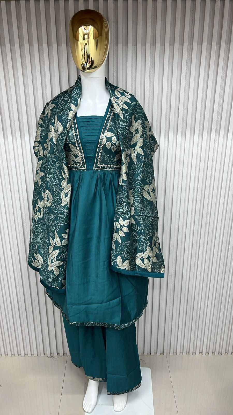 classic straight-cut kurti, with an intricately embroidered yoke