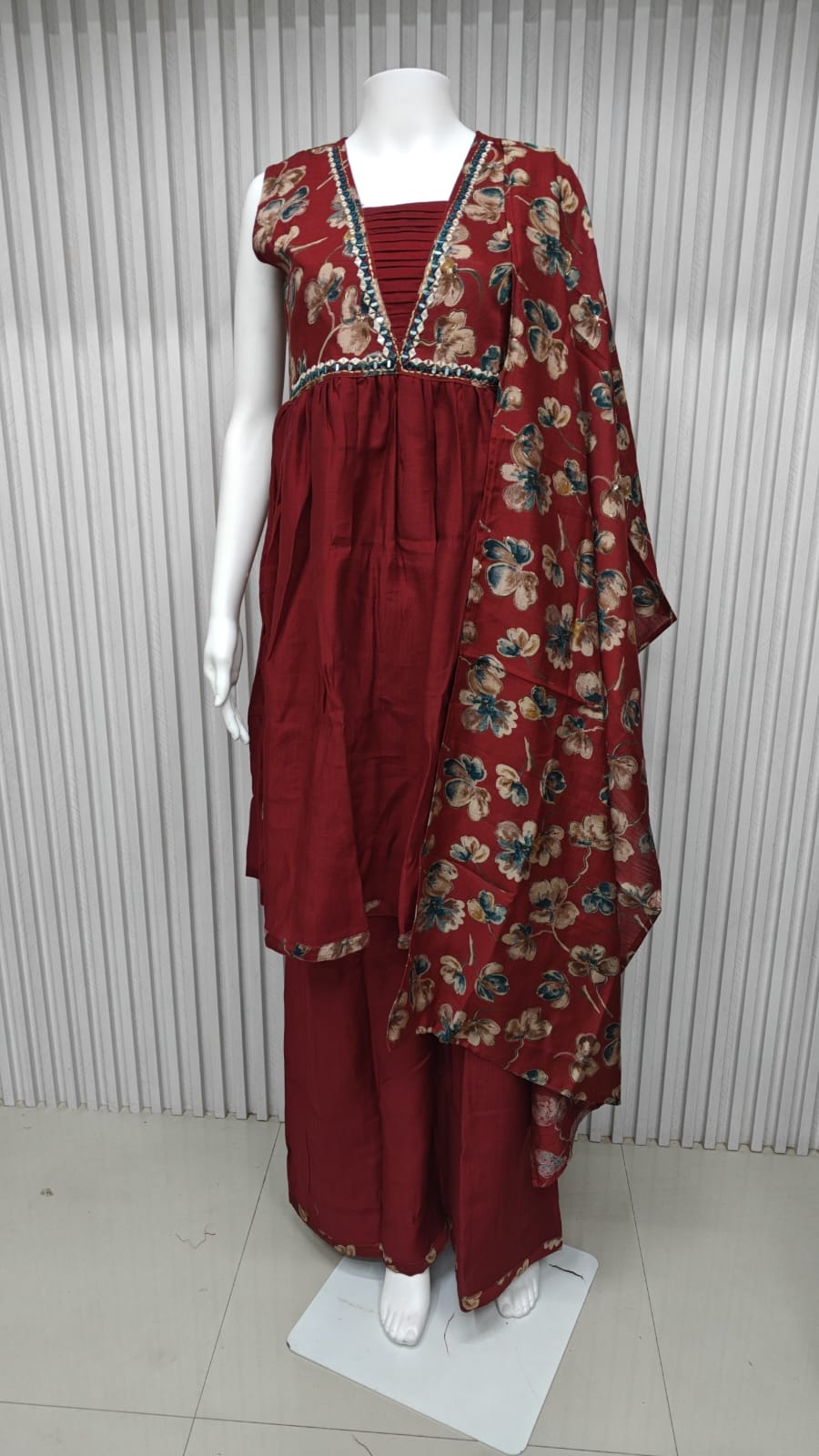classic straight-cut kurti, with an intricately embroidered yoke