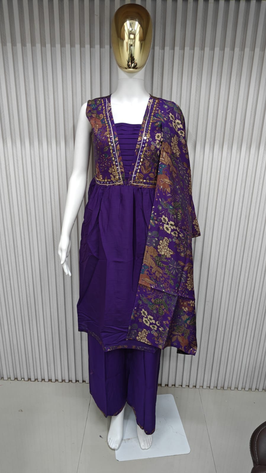 classic straight-cut kurti, with an intricately embroidered yoke